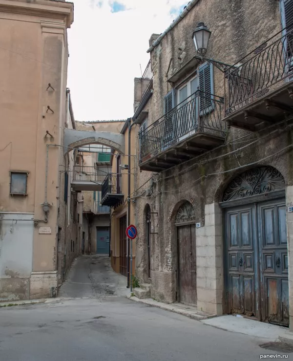 Narrow small street with arch overlappings, Corleone