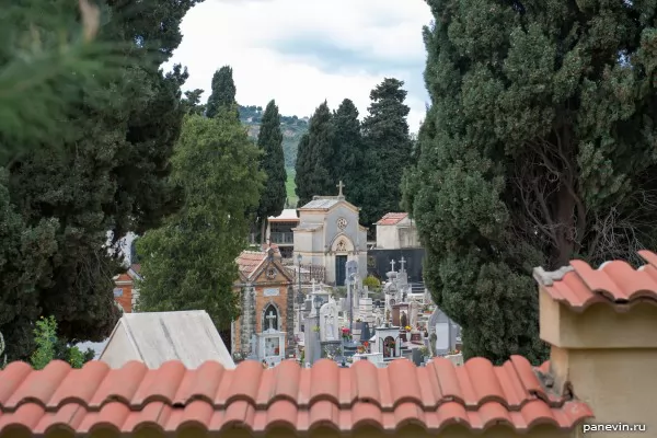 Cemetery of Corleone, rows of tombs, a photo through a fence