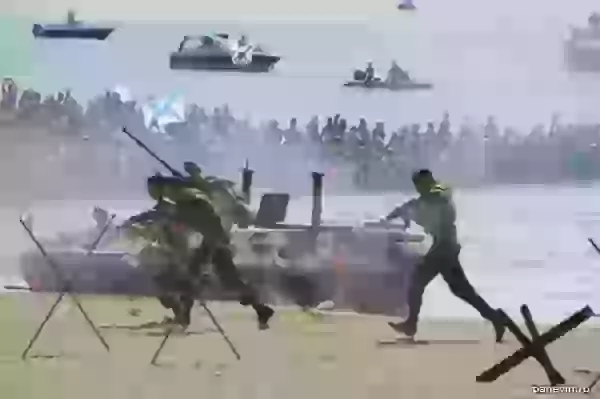 Celebrating Navy Day, Marines attack