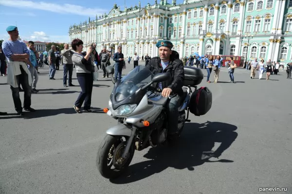 Commando by a motorcycle