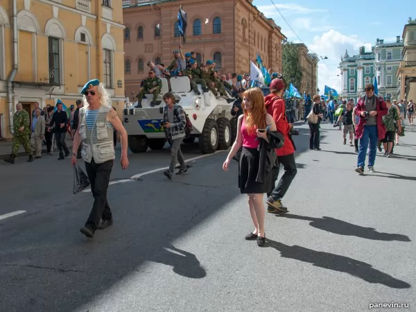 an armored troop-carrier of commandoes, procession on Millionaya street