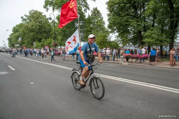 Bicyclist with flags