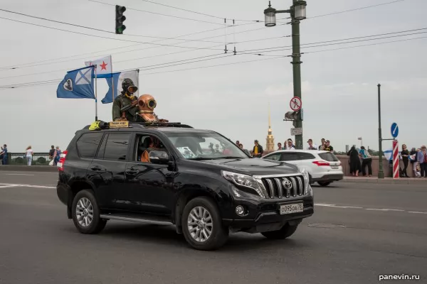 Land Cruiser with flags