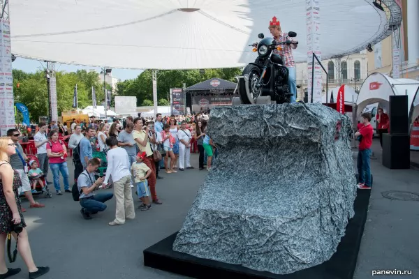 Pedestal with a motorcycle