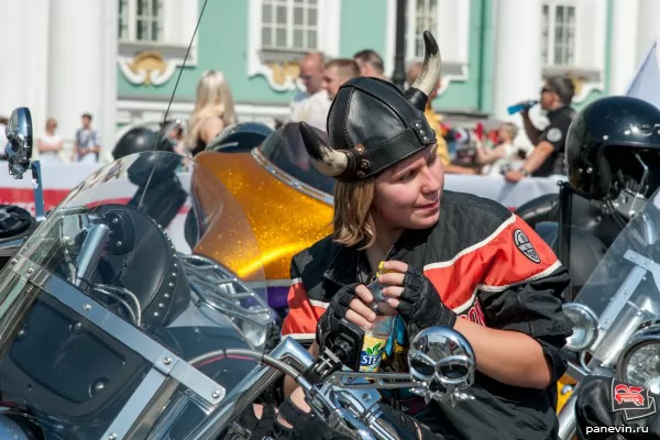 Bike-girl in viking helmet