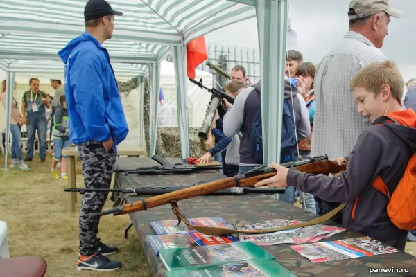 Boy with Mosin's rifle