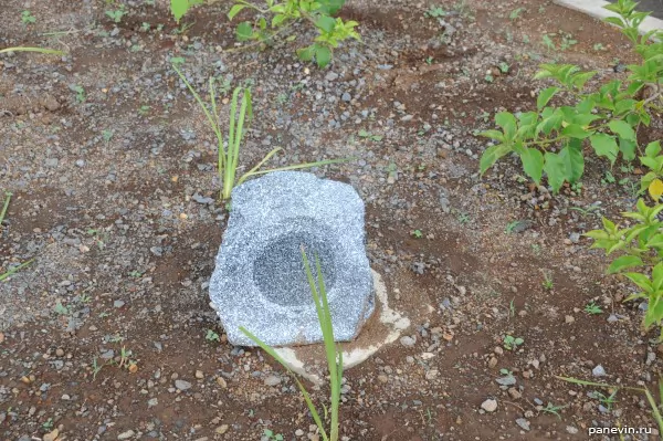 Audio-column disguised under a stone