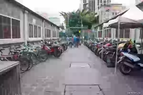 Parking of motorcycles and motor scooters at the city market