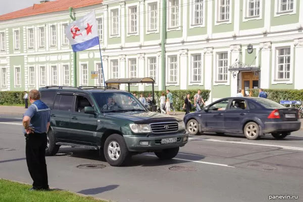 Land Cruiser with a Navy flag