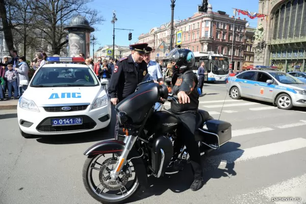 Biker and police officers