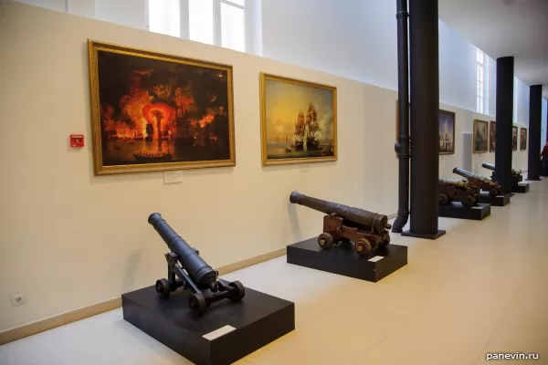 Ancient ship cannons and paintings of sea battles with Turks
