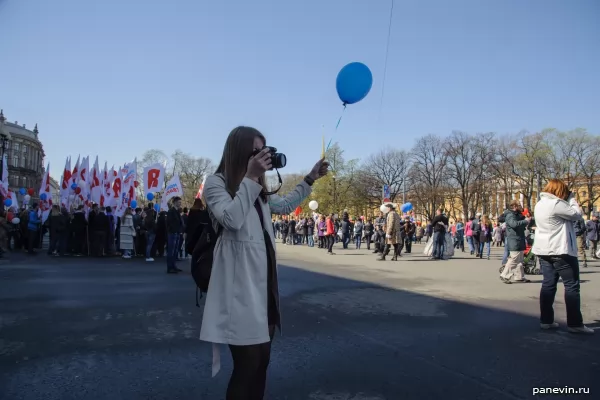 Girl-photographer with a ball