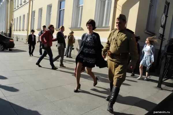 Passer-by in a soldier's blouse