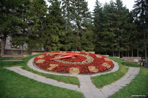 Flower bed with a clock