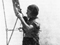 Альпинистрка Ольга Афанасьевна Фирсова на шпиле Адмиралтейства. Маскировочные работы, сентябрь 1941 года
