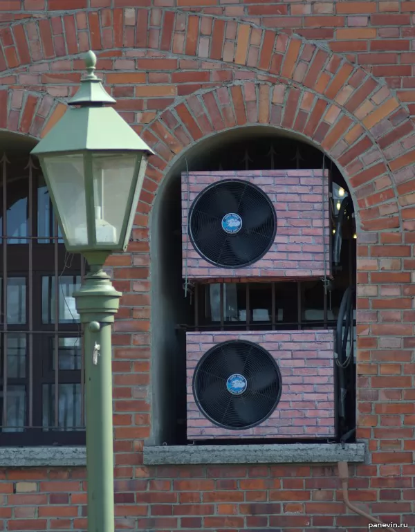 Lantern, brick wall, air conditioning