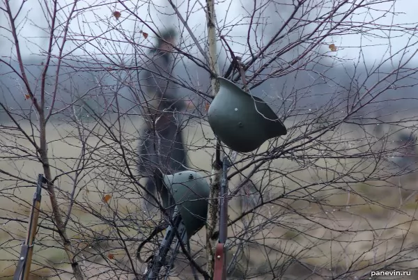 Helmets and rifles on positions of Finns of a photo — Winter war