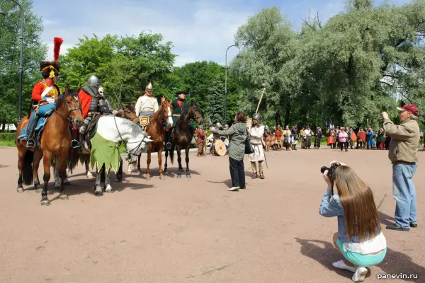 Photographers and horsemen of different epoch