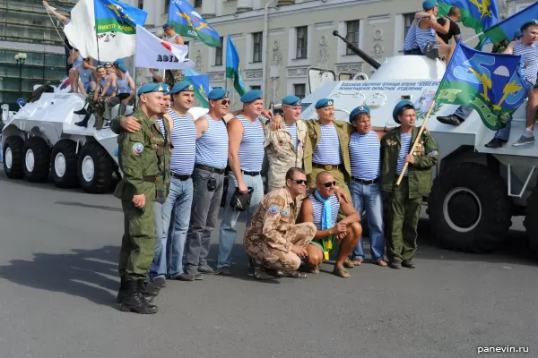 Commandoes are photographed at armored troop-carriers