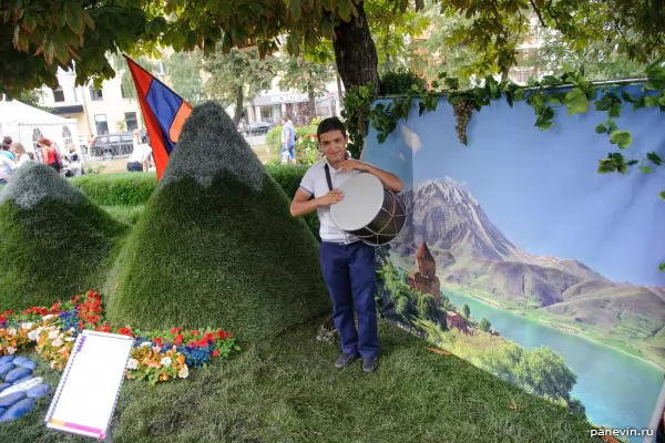 Armenian boy with a national drum