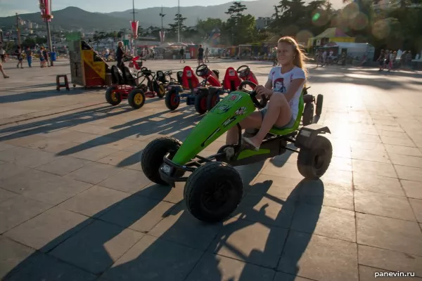 Girl on a velomobile