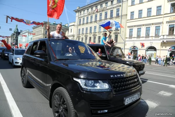 Motorists with flags