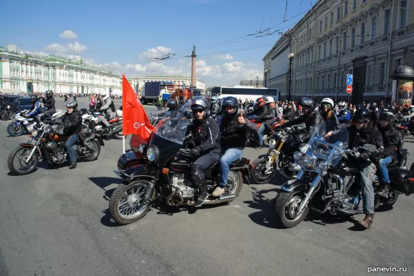 Columned bikers at Palace Square