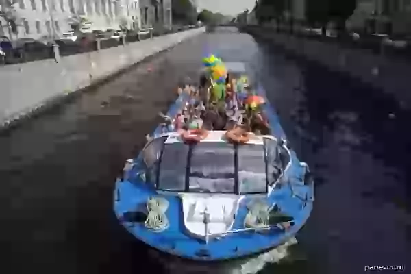 Ship with children`s ensemble on Krjukov channel