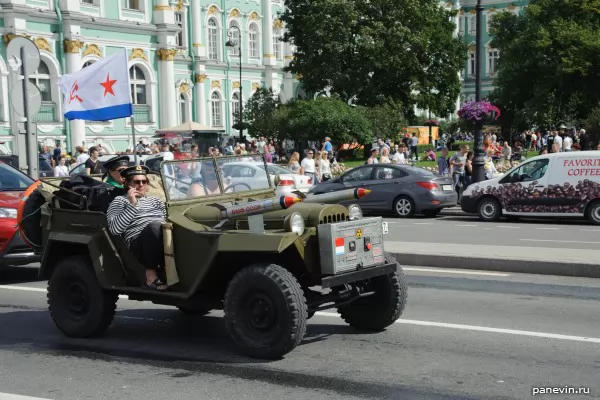 Seamen in jeep