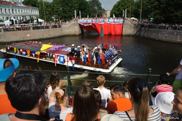 Spectators and river carnival