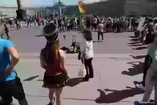 Breakdance, girl in «hussar» costume and tourist with the flag of Bolivia